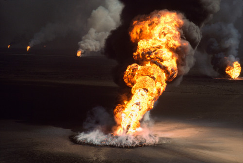 KUWAIT. Burgan oil fields. An oil set ablaze by the Iraqi invaders. 1991.